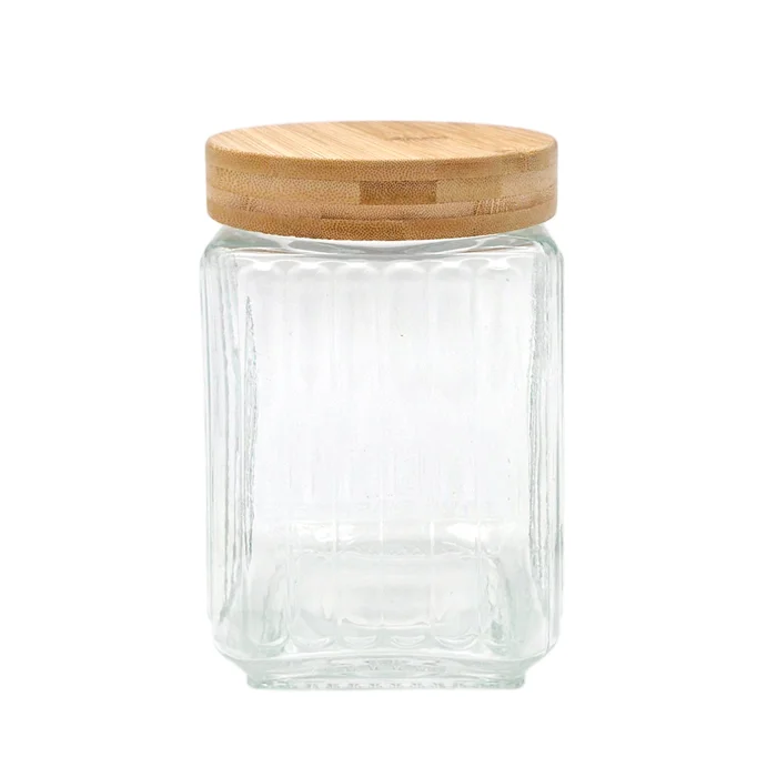 Frasco de vidrio facetado con tapa de bambú